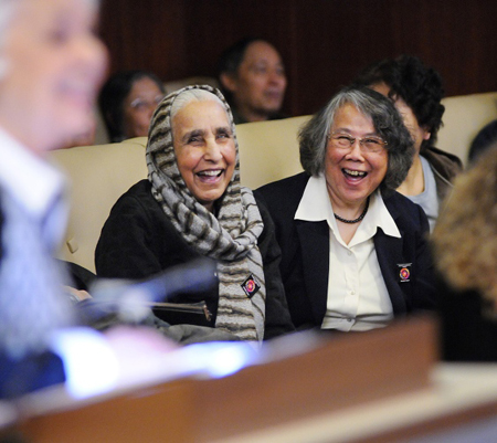 Dozens of seniors were at the finance meeting at city hall Wednesday morning. Mohinder Sidhu (L) and Mabel Leung react to comments made to council by activist Lorna Gibbs. Dan Toulgoet